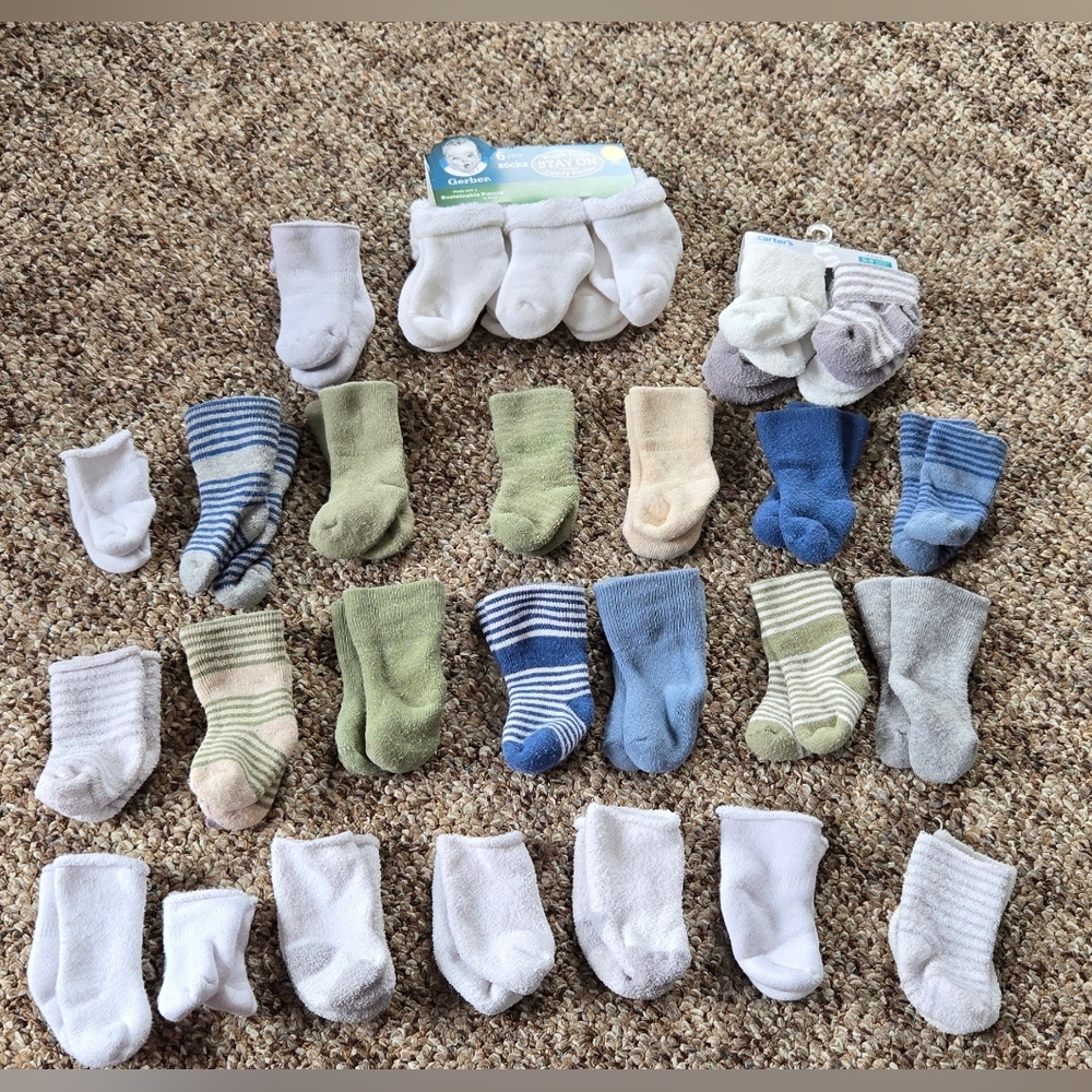 32 pairs of 0-6 month baby socks
